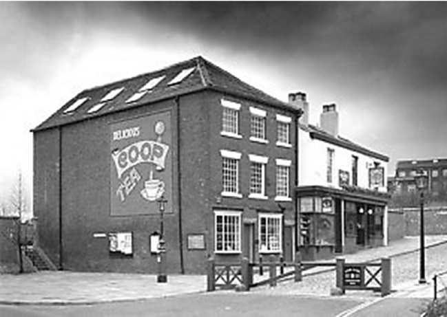 Archivo:Primera cooperativa en Rochdale.jpg